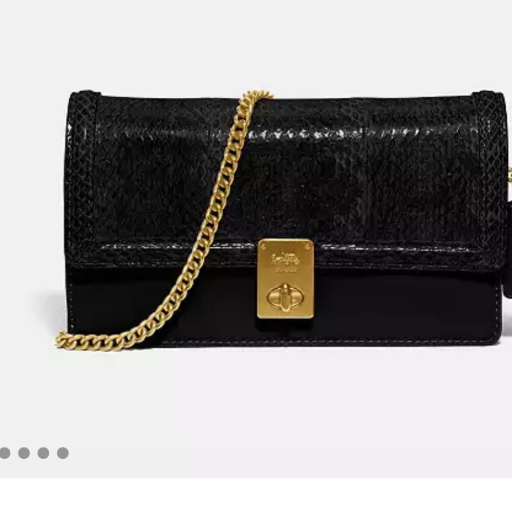 Genuine snakeskin and refined calf leather
Eight credit card slots